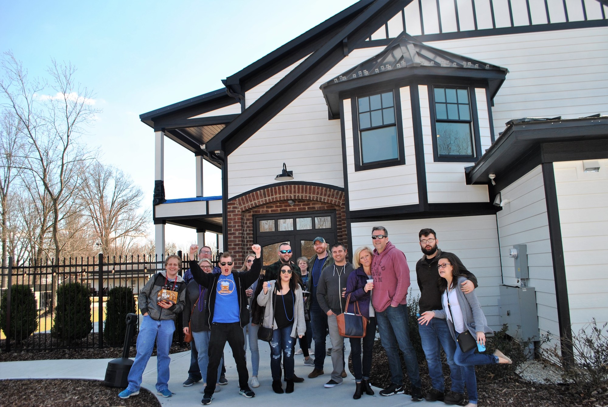 DSC_03441 a group of people standing in front of a building