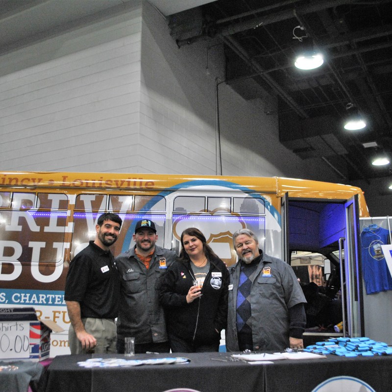 a group of people standing in front of a store
